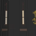 Modern Symmetric Wall Lamps With Metal Frame Glass Shades And Warm Glow On Dark Wall
