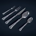Elegant Silver Cutlery Set Featuring Forks Knives Spoons And Decorative Handles On Dark Background
