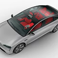 Silver Electric Sedan With Red Seats And Modern Sleek Autonomous Design