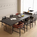 Dark Wooden Dining Table with Mixed Chairs and Fruits in Modern Kitchen with Paneled Wall