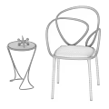 Modern Black Leisure Chair With Curved Metal Frame And Side Table Decor