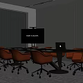 Modern Conference Table With Orange Chairs Laptop And Screen In Office