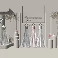Elegant Bridal Window Display With White Pink Wedding Dresses Floral Decorations And Cake Displays