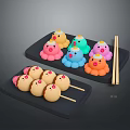 Colorful Cartoon Shaped and Brown Round Food Skewers on Black Trays