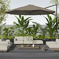 Cozy Outdoor Sofa Set on Wooden Deck with Patio Umbrella and Green Plants