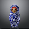 Traditional Matryoshka Doll With Blue White Floral Patterns And Red Hair