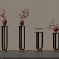 Black Flower Stands With Wooden Base Red Vases And Plants With Red White Blooms