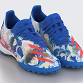 Blue Soccer Shoes With Colorful Anime Patterns Red Stripes And Cleats