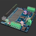 Blue Electronic Circuit Board With Green Terminals Silver Knobs Black Chips And Components