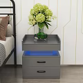 Gray Bedside Table with Drawers Clear Vase Green Flowers and Blue LED Light