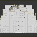 White Multi Layered Architectural Building Model With Green Plants Small Towers And Domed Structures
