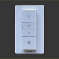 Philips White Switch Featuring Three Buttons And Round Button With Symbols
