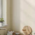 Light Beige Kitchen Corner With Green Plant Wooden Cutting Board And Appliances