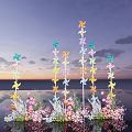 Colorful Windmill Decorative Setup With Pink White Flowers And Sunset Water Reflection