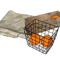 Metal Mesh and Brown Storage Baskets with Oranges and Leaf Patterned Cloth
