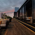 Rooftop Bar Outdoor Lounge With Sofa Table Wine Bread Umbrella And Evening View
