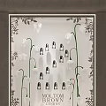 Stylish Shop Window Display With Lily of the Valley Decor And Small Bottles