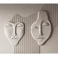 Modern White Face Sculptures As Wall Decor With Striped And Wavy Patterns 3d model