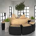 Casual Sofa Set With Wave Design Beige And Black Seats Green Plants In Bright Room