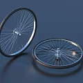 Two Bicycle Tires with Metal Rims and Spokes on Dark Blue Background