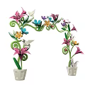 Colorful Event Arch Decorated With Floral Designs Spiral Green Leaves Butterflies And Birds