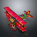 Red Biplane Model With Gold Green Accents For Cosmic Aerospace