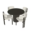 Modern Round Dining Table and Chair Set With White Upholstered Seats and Black Fluted Legs