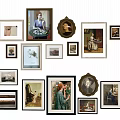 Gallery Wall With Framed Artworks And Photos In Various Sizes Shapes On White Striped Wall