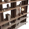 Modern Wooden Bookcase With Shelves Holding Books Vases Bowls And Sculptures
