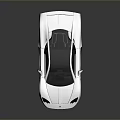 White Sports Car With Sleek Aerodynamic Body Black Roof And Alloy Wheels
