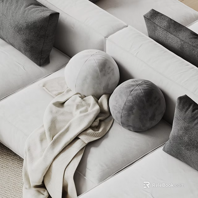 Light Colored Sectional Sofa With Round Gray Cushions And Soft Blanket 3d model