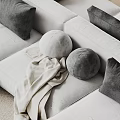 Light Colored Sectional Sofa With Round Gray Cushions And Soft Blanket 3d model
