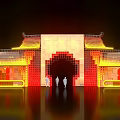 Traditional Chinese Architectural Facade With Illuminated Archway And Red Bricks