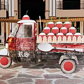 Mobile Gelato Vending Tricycle With Red Topped Ice Cream Cones And Wooden Spoons