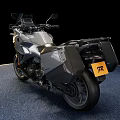 Silver Touring Motorcycle With Sleek Design Black Seat And Side Cases