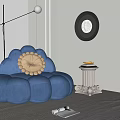Cloud Shaped Blue Single Sofa With Side Table Books Wall Decorative Painting And Floor Lamp