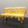 Yellow Public Chair With Orange Spots White Dripping Decor Eyes Design And Brown Legs