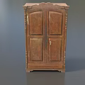 Vintage Wooden Wardrobe with Intricate Carved Details and Double Doors Design