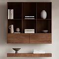 Wooden Shelf Unit with Multiple Compartments Holding Books Vases and Bowls and Lower Shelf