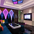 Stylish KTV Lounge Interior With Teal Sofas Colorful Cushions And Decorative Murals