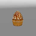 Delicious Golden Cupcake With Swirled Vanilla Frosting And Caramel Drizzle On White Background
