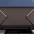 Modern Exterior Awning On Gray Building With LED Strip Lights And Blue Sky