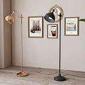 Stylish Gold Black Floor Lamps with Framed Artworks Round Mirror Green Plant in Interior