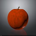 Juicy Red Apple With Brown Stem Smooth Surface And Reflection On Gray Background