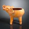 Elephant Shaped Orange Ceramic Pot For Home Decor And Storage Use