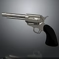 Silver Metal Revolver With Black Grip And Shiny Finish On Dark Background