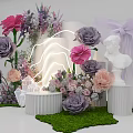Floral Installation with Pink Purple Flowers White Columns Neon Light Statue and Green Grass Base