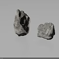 Two Natural Stone Rocks With Rough Reflective Surface Texture On Gray Background
