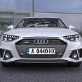 White Audi Sedan With Modern Sporty Exterior And Luxury Interior Design