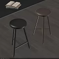 Stylish Black and Brown Bar Stools With Leather Seats And Wooden Legs In Modern Interior